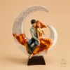 Romantic Couple on Crescent Moon Decorative Showpiece